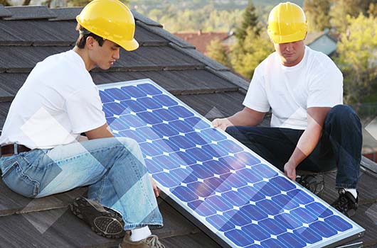 Solar Energy Loan - Professionals installing solar panels.